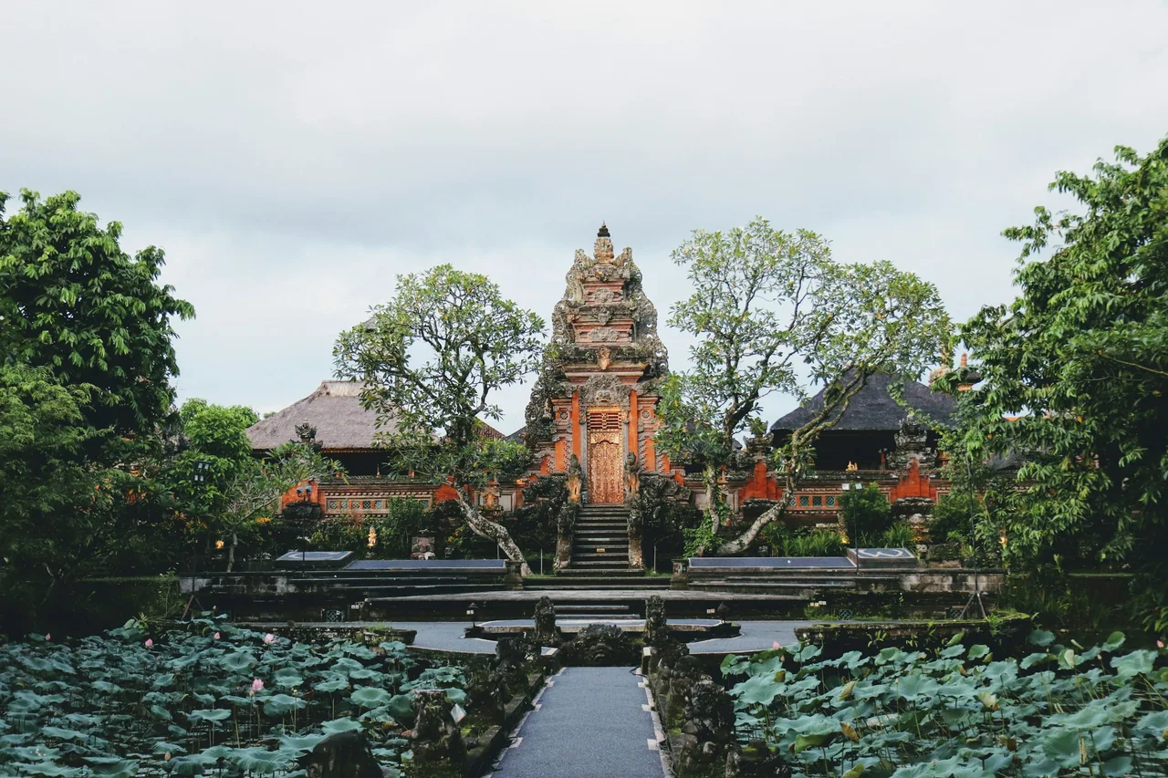 A Balinese temple gateway at the end of a garden path