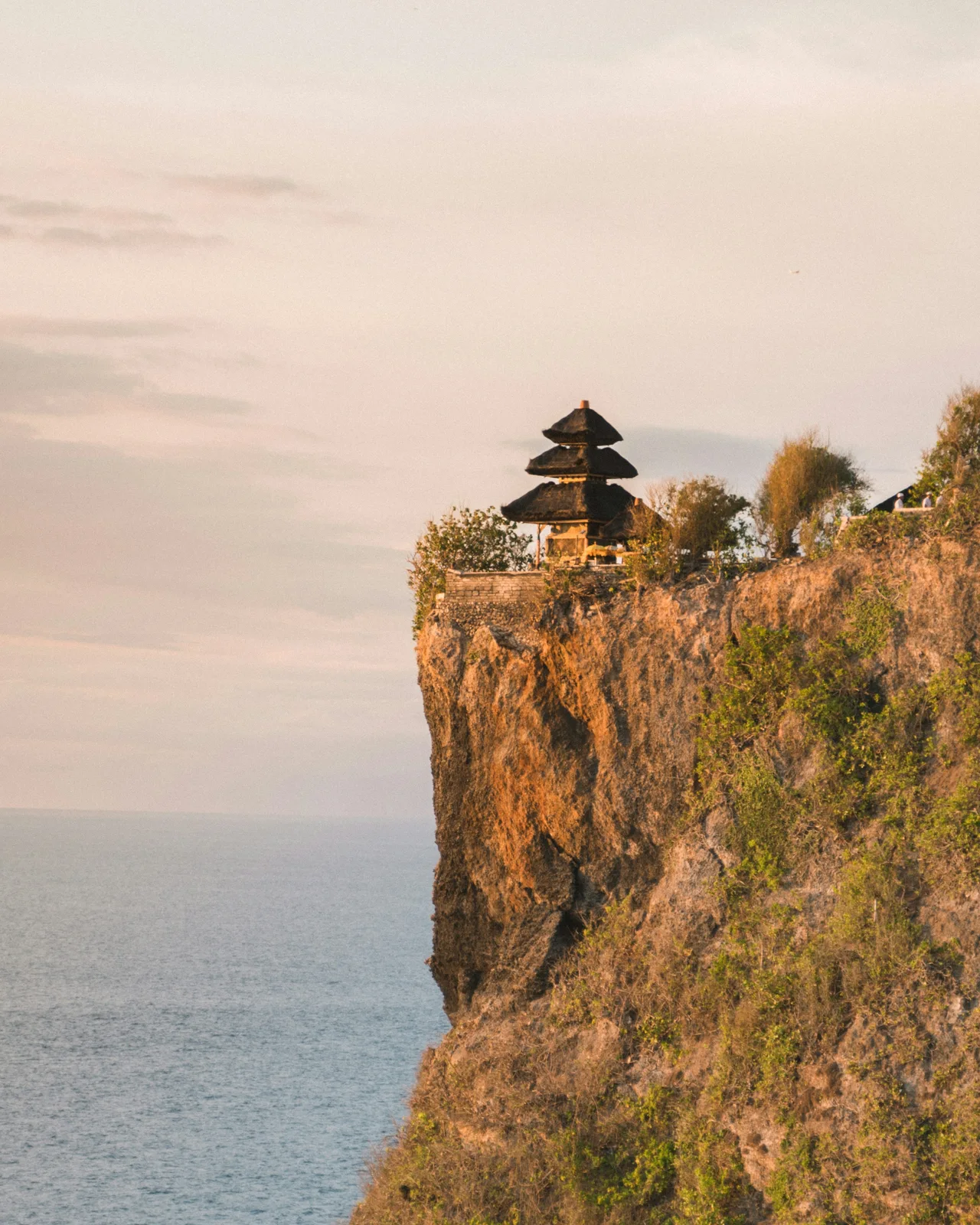 Temple rooftops above the coastal cliffs of Uluwatu