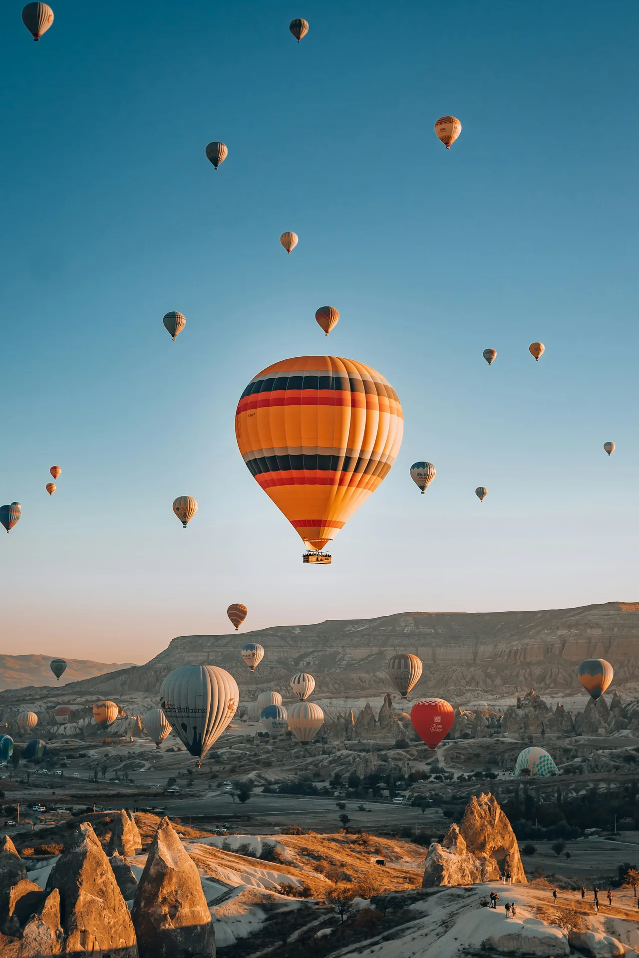 A hot-air balloon above Cappadocia’s rocky landscape