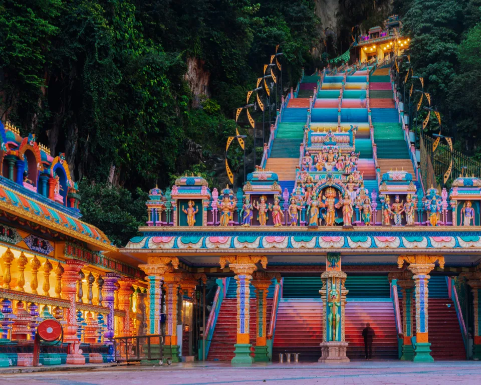 Brightly painted temple facade below the colourful Batu Caves staircase