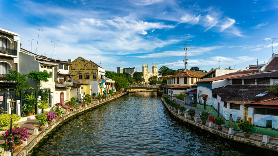 Colourful historic buildings lining the Melaka River