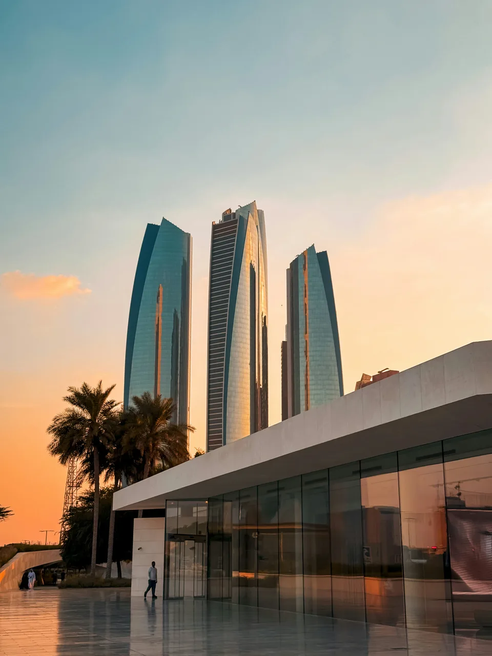 Modern towers and palm-lined architecture in Abu Dhabi