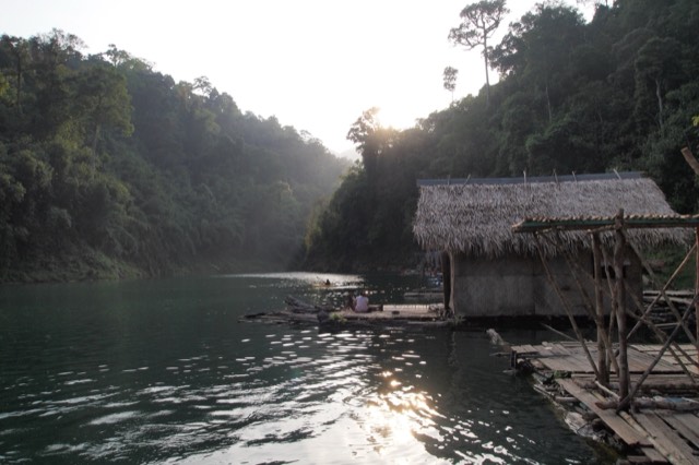 Wooden floating houses on the jungle-lined lake in Khao Sok